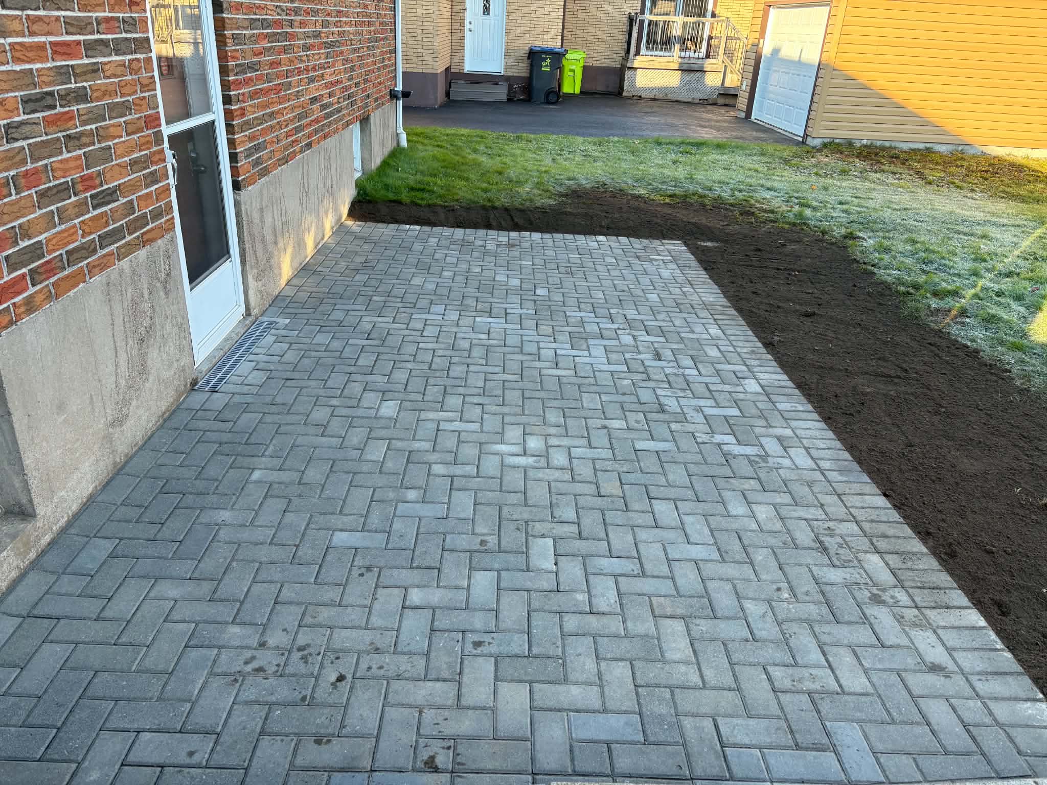 Finished interlocking patio installed by PMK Construction